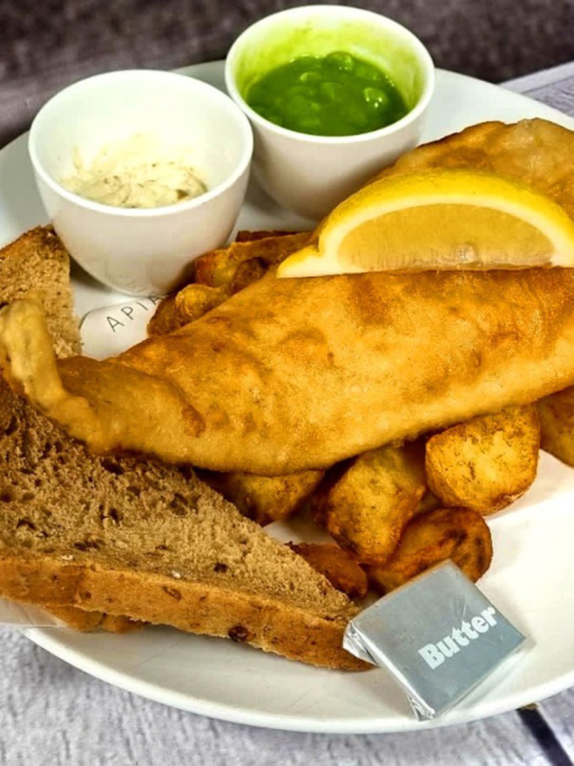 Apiary Fish & Chips. 8oz Cod fillets in gluten-free batter.